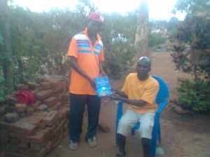 Malawi-Giving book away
